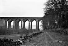 Peak Forest Tramroad, Chapel Milton Viaducts, with the tramway passing beneath. 3 April 1931