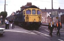09.54 London Waterloo - Weymouth Quay boat train in the streets of Weymouth (WTQ @ 169m 66ch). 20 June 1981