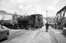 0-4-0ST 47000 with a train on the Killer's Branch crossing the Wirksworth to Middleton road. 12 May 1966